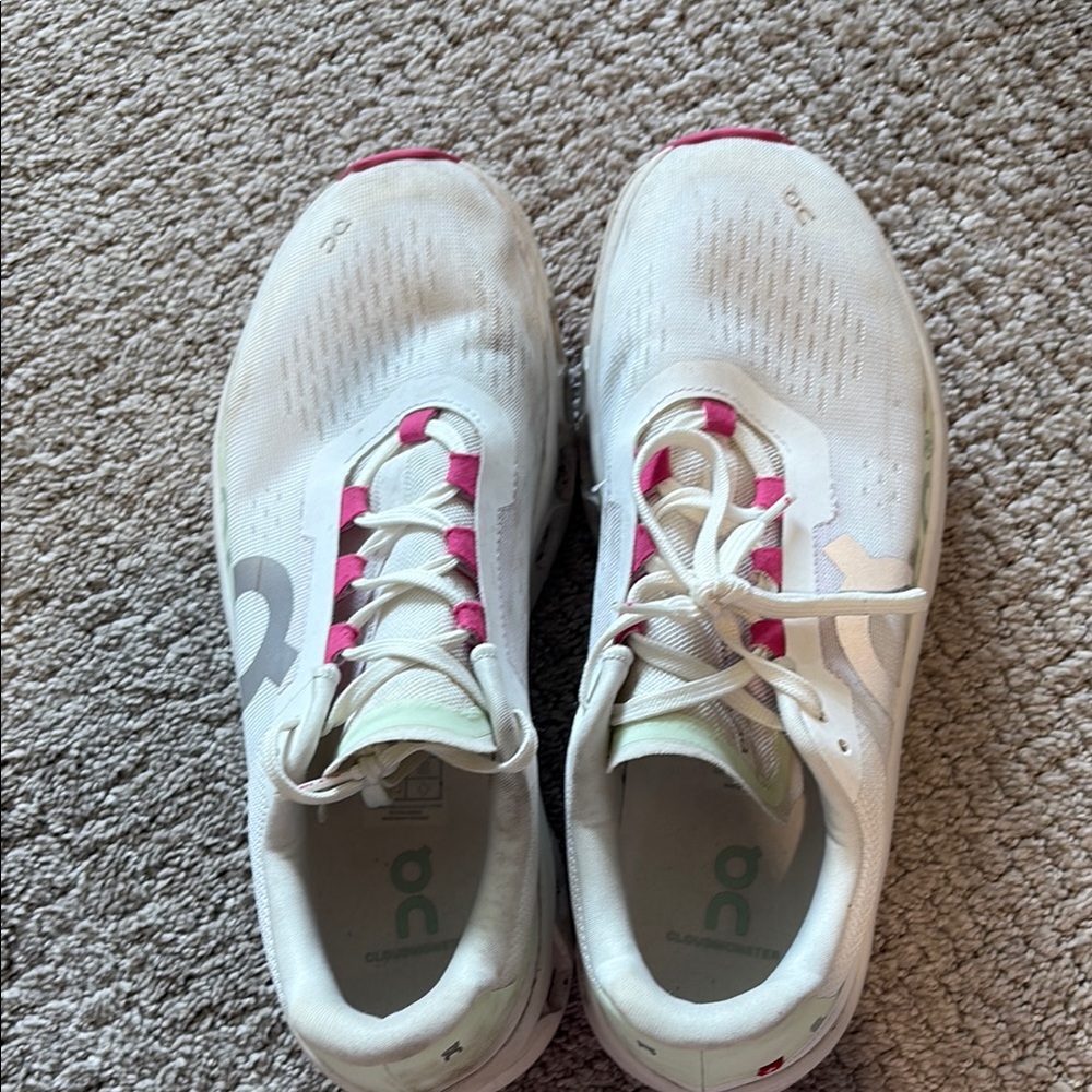 On Running White and Pink Sneakers Sleek Design